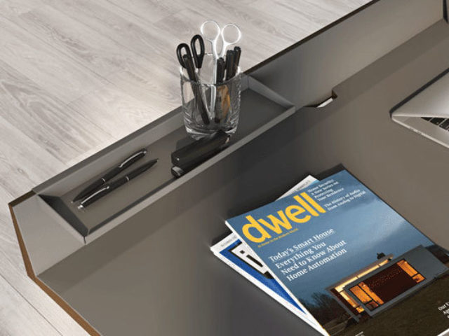 The Bevel 6743 modern office desk includes a convenient mezzanine storage tray that can be positioned anywhere along the top tier of the desk and is handy for keeping everyday office supplies close at hand.