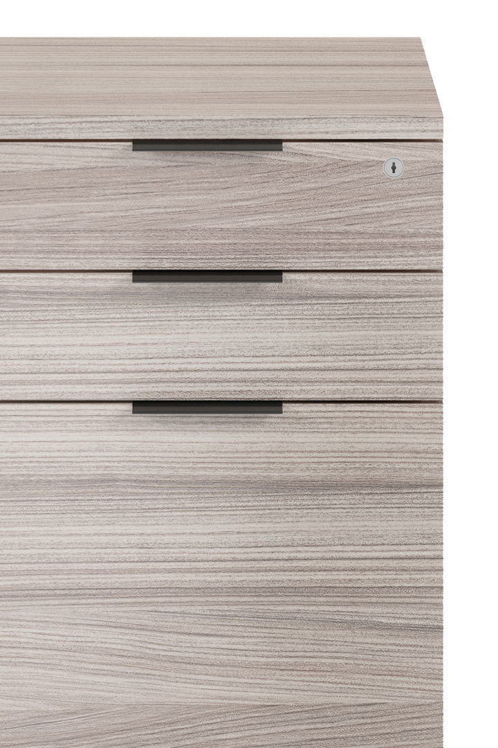 An integrated lock on the 6907 mobile file pedestal secures multiple soft-closing drawers with a single key; replacement locking cylinders are available if needed.