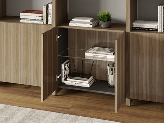 Linea's soft-close doors conceal an additional adjustable glass shelf, providing a convenient and concealed storage solution.