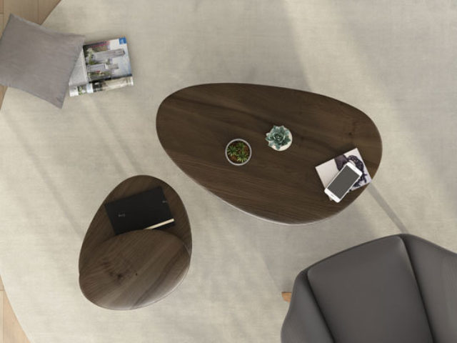 The gentle, curved shape of the Orlo 1953 coffee table and matching 1956 end table work with a variety of seating configurations and upholstery.